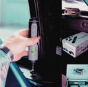 TopLift Pros Turn Pro cordless driver with bits and station for hardtop bolts, rechargeable power tool in use.