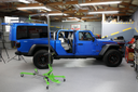Jeep Gladiator Gladiator Pro hardtop removal and storage tool by TopLift Pros, shown installed on a Jeep Gladiator vehicle.