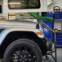 TopLift Pro V2 hardtop removal and storage tool for Jeep Wrangler and Ford Bronco, shown in use with vehicle hardtop.